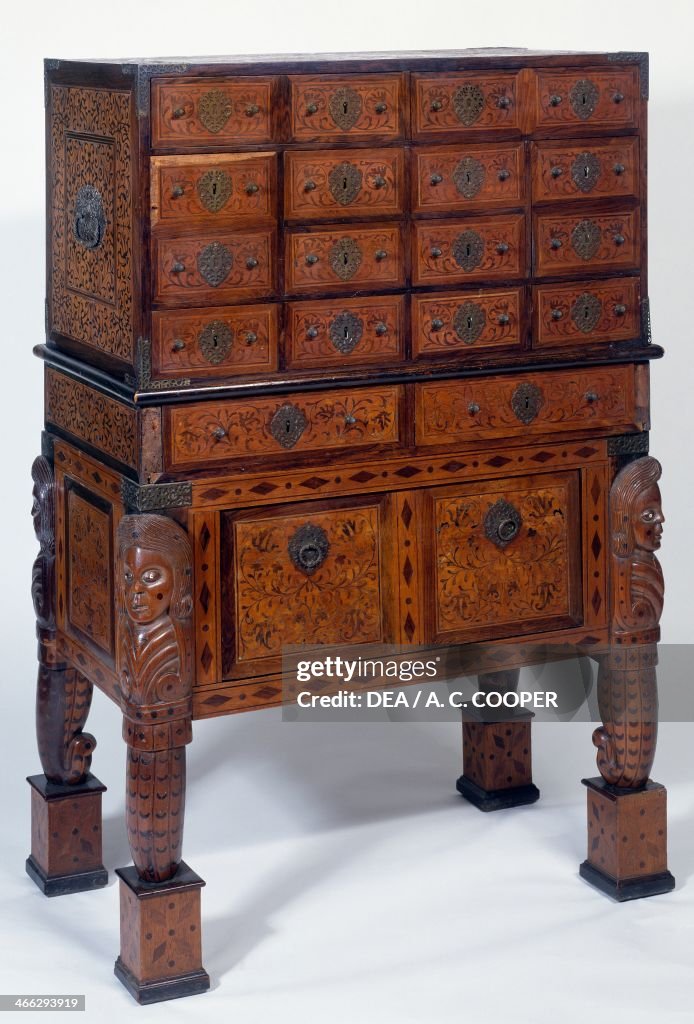 Teak cabinet with rosewood inlays...