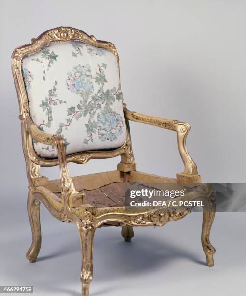 Regency style Second Empire carved and gilt wood armchair with a queen backrest. France, second half 19th century.