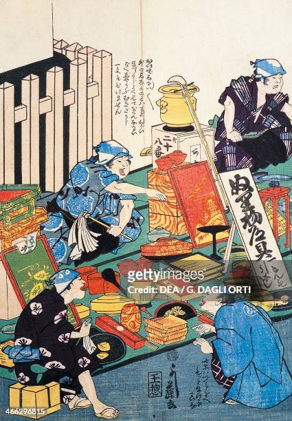 Stand with boxes, fans, books and kakemonos, 19th century, ukiyo-e art print painted on roll, from the Kabuki theatre series, woodcut. Japanese...
