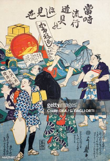 Stall selling boxes, fans, books and kakemonos, 19th century, ukiyo-e art print painted on a scroll, from the Kabuki theatre series, woodcut....