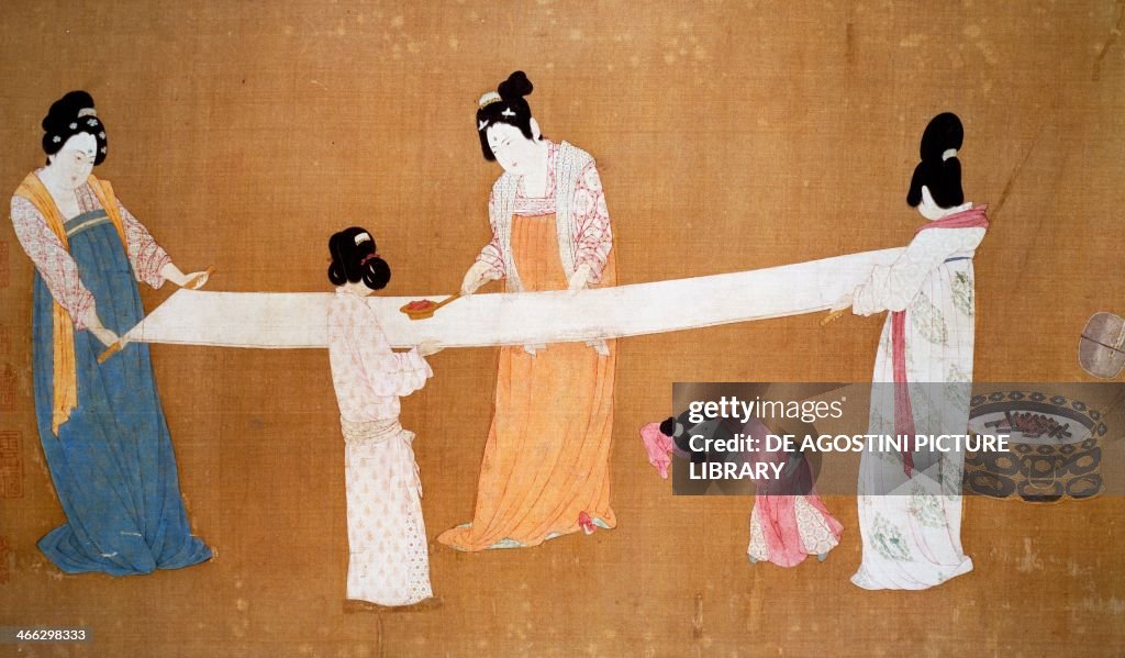 Ladies preparing newly woven silk