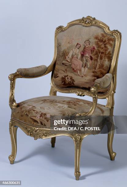 Louis XVI style Second Empire gilt wood armchair with d'Aubusson upholstery copy. France, 19th century.
