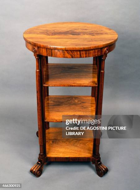 Small round Regency style blond rosewood bookcase, ca 1830. United Kingdom, 19th century.