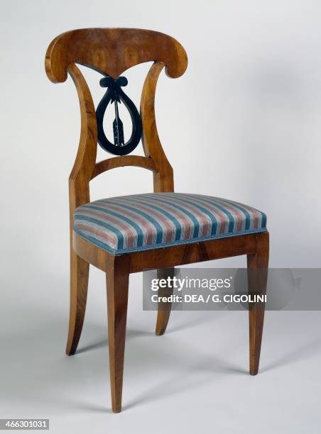 Biedermeier style cherrywood and ebonized wood chair, 1820-1830. Austria, 19th century.