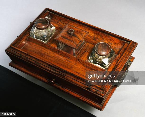 Regency style ewood central inkwell with crystal bottles for ink, ca 1810-15. United Kingdom, 19th century.