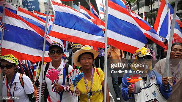 Anti-government protesters march through the city centre on February 1, 2014 in Bangkok, Thailand. Voters are due go to the polls on February 2nd,...