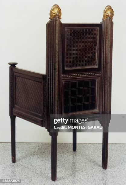 Armchair, retro, by Ettore Zaccari , walnut with gilding. Italy, 20th century.