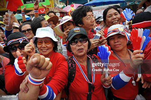 Anti-government protesters rally through Chinatown on February 1, 2014 in Bangkok, Thailand. Many supporters of the anti-government movement wore...