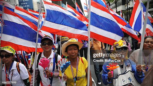 Anti-government protesters march through the city centre on February 1, 2014 in Bangkok, Thailand. Voters are due go to the polls on February 2nd,...