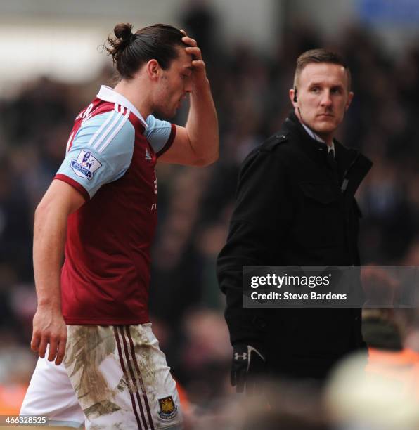 Andy Carroll of West Ham United reacts as he is sent off after a clash with Chico Flores of Swansea City during the Barclays Premier League match...