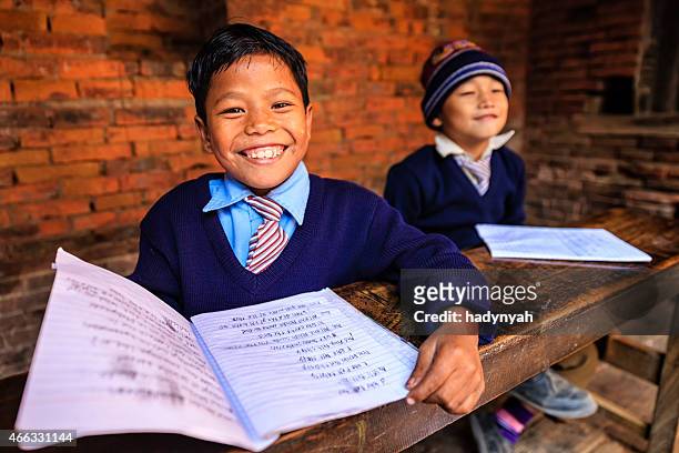 young nepali boys in classroom - nepal child stock pictures, royalty-free photos & images