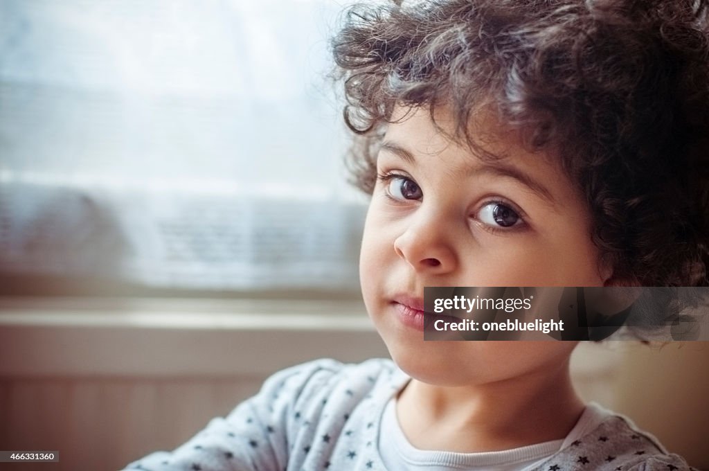 Close up of a young boy who is about 3 years old