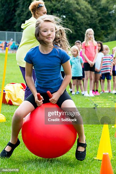 space hopper challenge - hoppity horse stock pictures, royalty-free photos & images