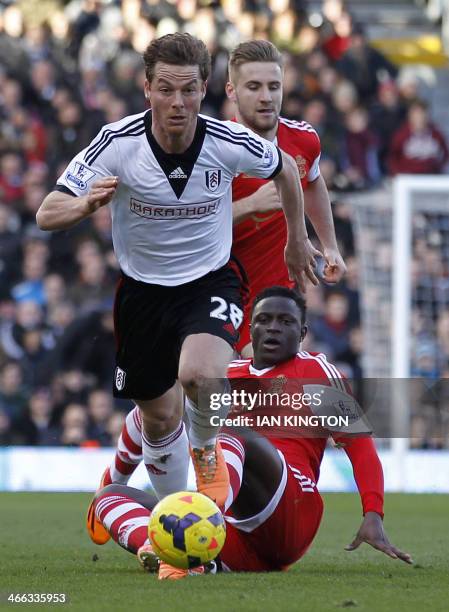 Southampton's Kenyan midfielder Victor Wanyama vies with Fulham's English midfielder Scott Parker during the English Premier League football match...