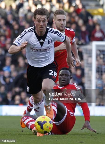 Southampton's Kenyan midfielder Victor Wanyama vies with Fulham's English midfielder Scott Parker during the English Premier League football match...