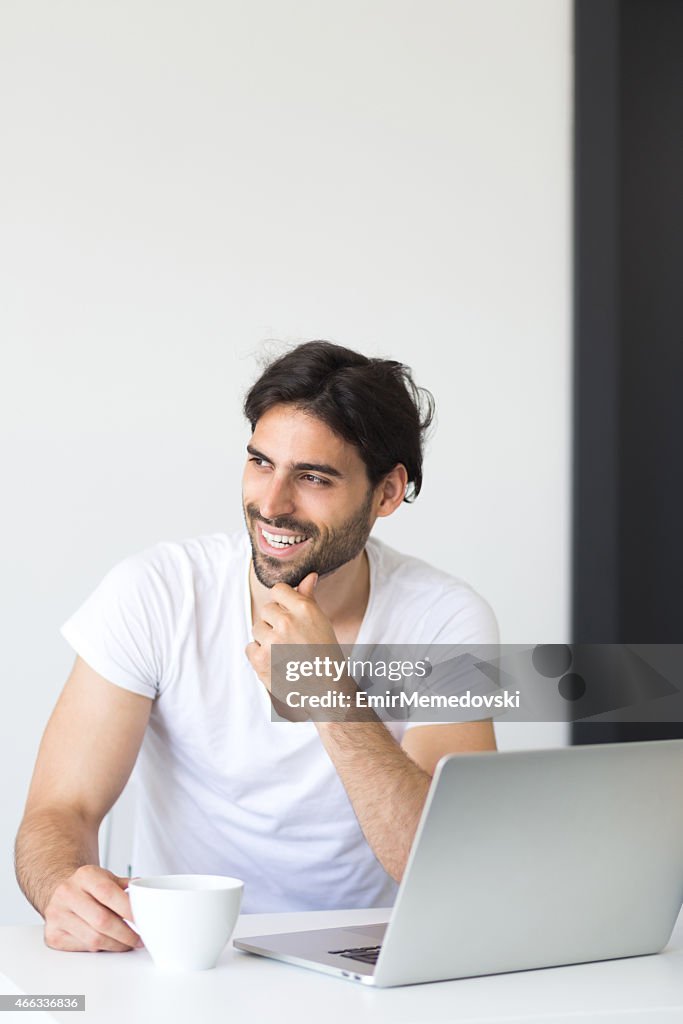 Young man working from home