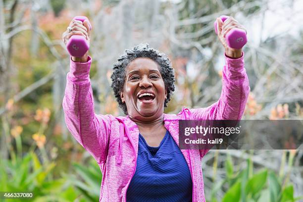 senior african american woman exercising - hand weight stock pictures, royalty-free photos & images