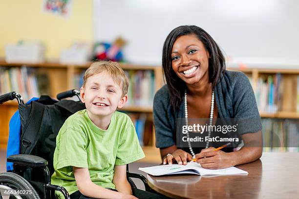 special needs boy - special education stock pictures, royalty-free photos & images