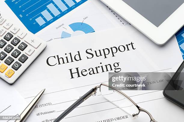 child support hearing form on a desk. - child support stock pictures, royalty-free photos & images
