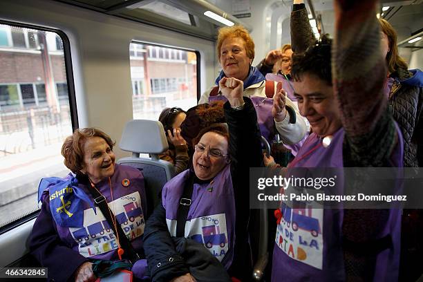 Begona Pinero and protesters traveling on the 'Freedom Train' shout slogans in a train on February 1, 2014 in Madrid, Spain. Pro-choice groups...