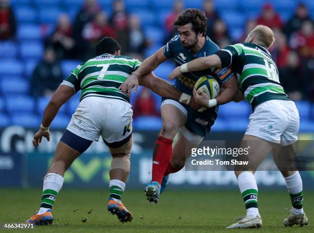 Gareth Owen of Scarlets is tackled during the LV= Cup Match between London Irish and Scarlets at the Madejski Stadium on February 1, 2014 in Reading,...