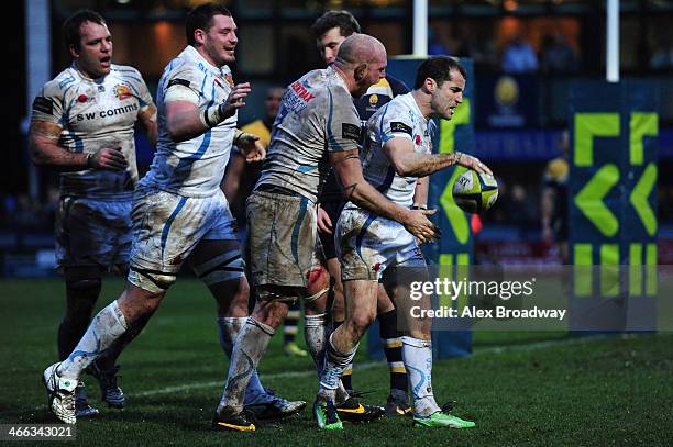 Haydn Thomas of Exeter Chiefs celebrates his try with his team-mates during the LV= Cup match between Worcester Warriors and Exeter Chiefs at the...