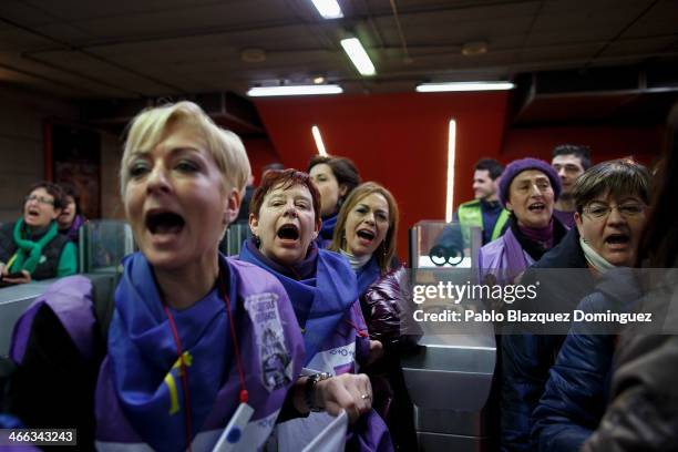 Protester traveling on the 'Freedom Train' shout slogans as they arrive to Atocha Station on February 1, 2014 in Madrid, Spain. Pro-choice groups...