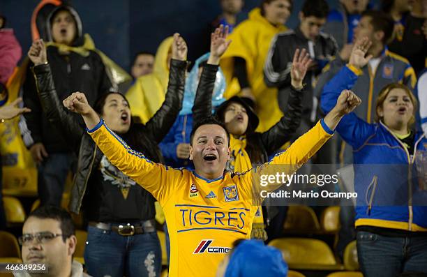 Fans of Tigres celebrate a goal during a match between Tigres UANL and Pachuca as part of 10th round Clausura 2015 Liga MX at Universitario Stadium...