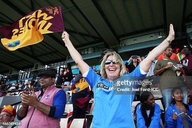 West Indies fan cheers a wicket during the 2015 ICC Cricket World Cup match between the West Indies and United Arab Emirates at McLean Park on March...