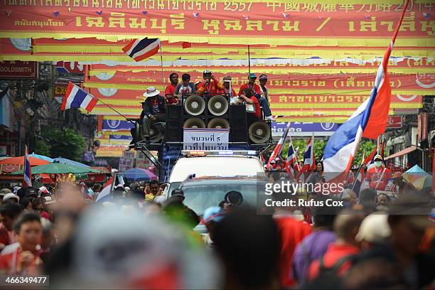 Anti-government protesters rally through Chinatown on February 1, 2014 in Bangkok, Thailand. In celebrating the Chinese New Year many anti-government...