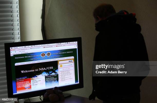 Visitor looks at a computer monitor displaying the website of the National Security Agency and Central Security Service at the Transmediale festival...