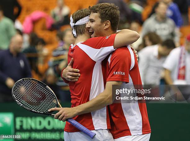 Michael Lammer and Marco Chiudinelli of Switzerland celebrate victory against Serbia after men's doubles match on day two of the Davis Cup match...