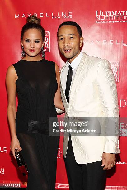 Christine Teigen and John Legend attend Super Bowl XLVIII Party Hosted By Shape And Men's Fitness at Cipriani 42nd Street on January 31, 2014 in New...