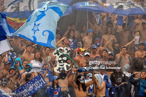 Fans of Millonarios cheer for their team during a match between Millonarios and Santa Fe as part of 10th round of Liga Aguila I 2015 at Nemesio...