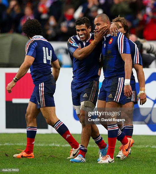 Gael Fickou of France is congratulated by Wesley Fofana of France during the RBS Six Nations match between France and England at Stade de France on...