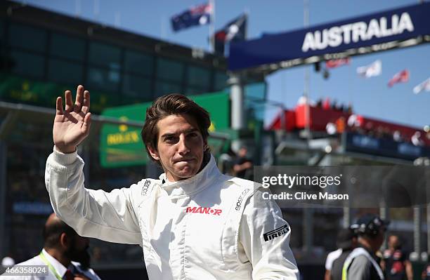 Roberto Merhi of Spain and Manor Marussia waves to the fans during the drivers' parade before the Australian Formula One Grand Prix at Albert Park on...