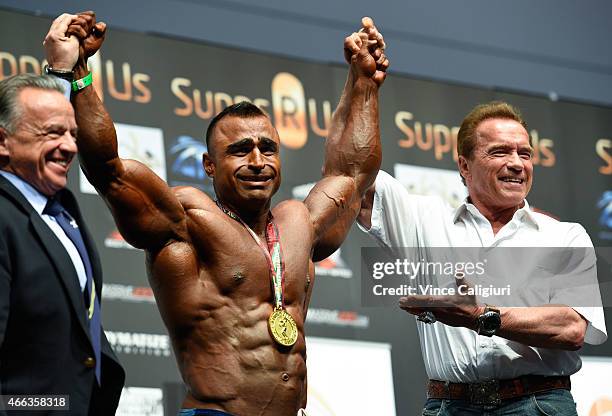 Arnold Schwarzenegger poses with Atif Anwar, winner of Arnold Classic over 100 class at the Arnold Classic at The Melbourne Convention and Exhibition...