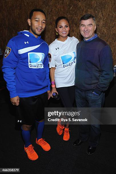 Singer John Legend, model Chrissy Teigen and DIRECTV Chairman, President & CEO Michael White attend the DirecTV Beach Bowl at Pier 40 on February 1,...