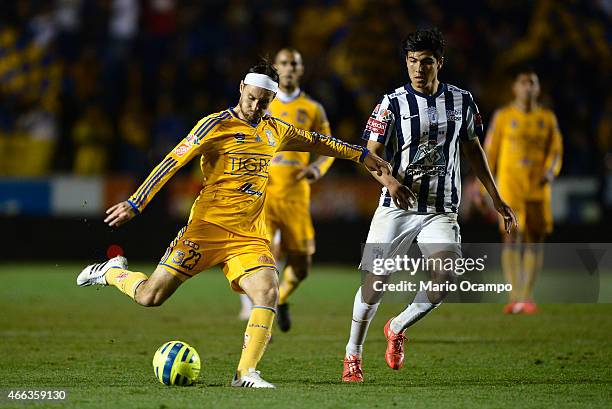 Edgar Lugo of Tigres kicks the ball during a match between Tigres UANL and Pachuca as part of 10th round Clausura 2015 Liga MX at Universitario...