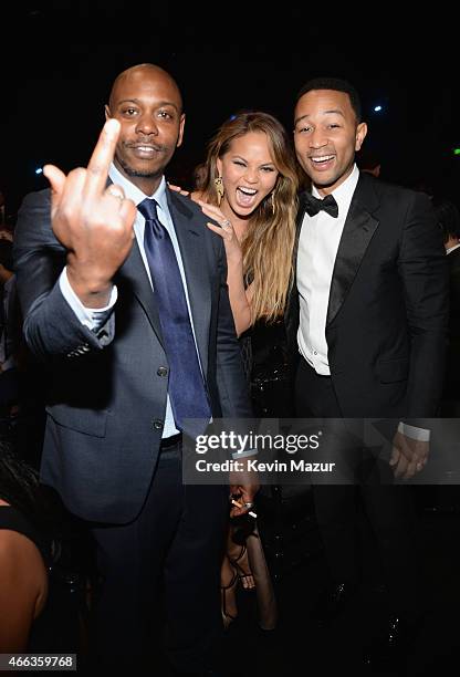 Comedian Dave Chappelle, model Chrissy Teigen and recording artist John Legend attend The Comedy Central Roast of Justin Bieber at Sony Pictures...