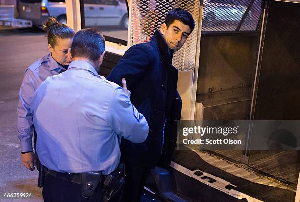 St. Louis Police arrest photojournalist Philip Montgomery at a protest staged by Ferguson activists on March 14, 2015 in St. Louis, Missouri. St....