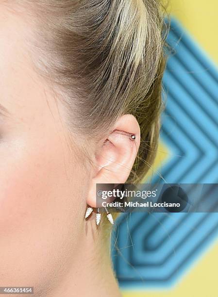 Actress Saoirse Ronan, earring detail, attends the "Lost River" premiere during the 2015 SXSW Music, Film + Interactive Festival at Topfer Theatre at...