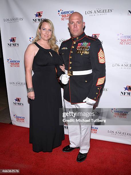 Hero Award recipient Chris Carlisle and guest attend the Salute to Heroes Service Gala to benefit the National Foundation for Military Family Support...