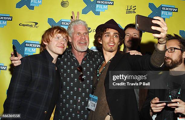 Actors Rupert Grint, Ron Perlman, Robert Sheehan, director Antoine Bardou-Jacquet and writer Dean Craig attend the premiere of "Moonwalkers" during...