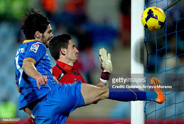 Goalkeeper Diego Marino of Real Valladolid CF stops the ball striked by Angel Lafita of Getafe CF during the La Liga match between Getafe CF and Real...
