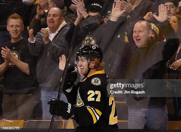 Dougie Hamilton of the Boston Bruins smiles after he scored against the Edmonton Oilers in the 3rd period at TD Garden on February 1, 2014 in Boston,...