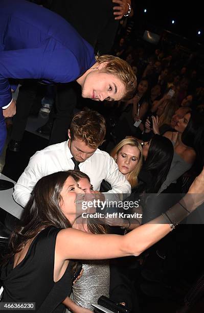 Honoree Justin Bieber poses for a selfie photo with fans at The Comedy Central Roast of Justin Bieber at Sony Pictures Studios on March 14, 2015 in...