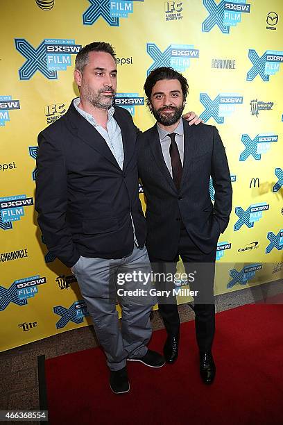 Alex Garland and Oscar Isaac walk the red carpet at the premiere of "Ex Machina" at the Paramount Theater during the South by Southwest Film Festival...