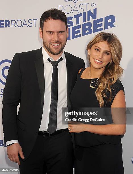 Manager Scooter Braun and wife Yael Cohen Braun arrive at the Comedy Central Roast of Justin Bieber on March 14, 2015 in Los Angeles, California.