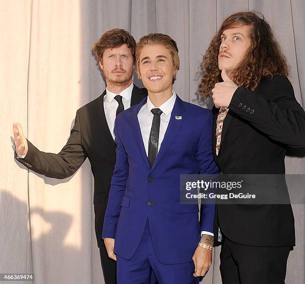 Actor Anders Holm, honoree Justin Bieber and actor Blake Anderson arrive at the Comedy Central Roast of Justin Bieber on March 14, 2015 in Los...